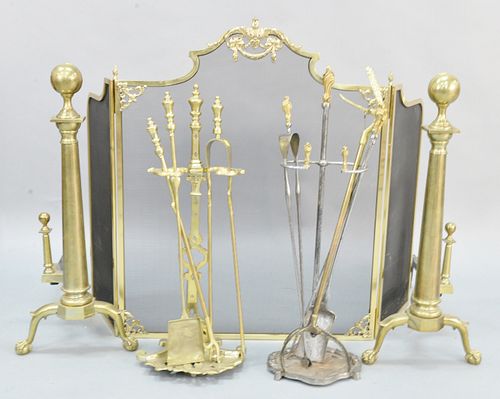 Fireplace group to include monumental brass andirons, two sets of tools along with three part screen, andiron ht. 34".