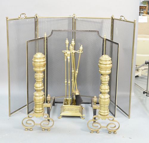 Five piece brass fireplace grouping to include a pair of andirons, ht. 26 1/2", two firescreens along with a set of fire tools.