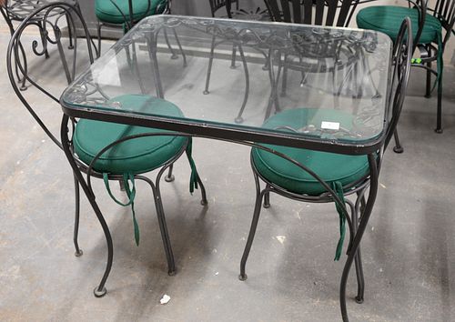 Six piece lot to include two outdoor glass top tables with four chairs, ht: 29", top: 24" x 32".