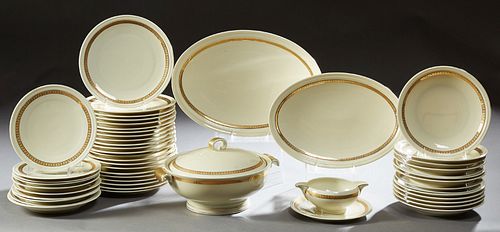 Fifty Piece Set of Gilt Leaf Banded French Limoges Dinnerware, early 20th c., by A. Lanternier & Co., consisting of 22 dinner plates...