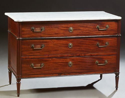 French Louis XVI Style Carved Mahogany Marble Top Commode, 19th c., the ogee edge figured cookie corner marble over a long frieze dr...
