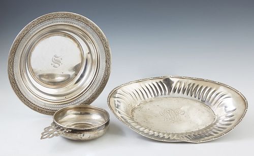 Three Pieces of Sterling, consisting of a porringer, by Gorham, #700; an oval bread bowl by Unger Brothers; and a reticulated circul...