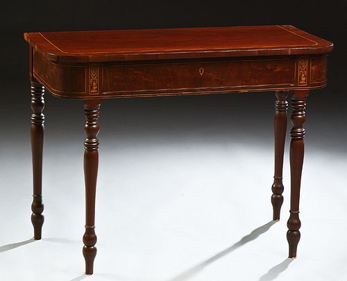 English Inlaid Mahogany Console Table, 20th c., the rounded corner top over a frieze drawer, on turned tapered legs, H.- 29 in., W.-...