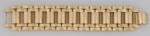 14K Yellow Gold Wide Link Bracelet, 20th c., H.- 1 3/16 in., W.- 7 1/2 in., D.- 3/16 in., Wt.- 2.47 Troy Oz. Provenance: from the co...
