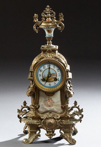 French Louis XVI Style Bronze and Porcelain Mantel Clock, 19th c., the surmount with a tapered floral painted Sevres style porcelain...