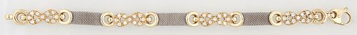 14K White & Yellow Gold Link Bracelet, the three white gold mesh links with yellow gold loop ends, joined by four yellow gold infini...
