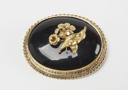 Early Gold and Onyx Brooch