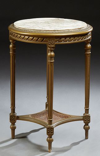 French Empire Style Beech Louis XVI Style Marble Top Pedestal Table, 19th c., the highly figured inset circular marble over a twist...