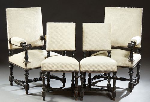 Four Piece Set of Carved Beech Louis XIV Style Dining Chairs, consisting of two fauteuils and two side chairs, the fauteuils with re...