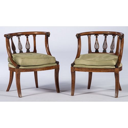 A Pair of Continental Armchairs with Rams Head Terminals
