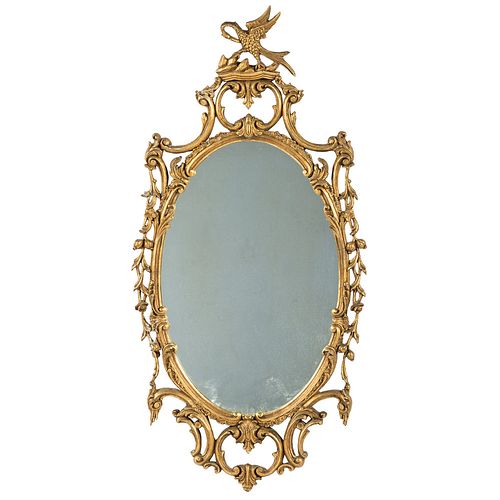 A Giltwood Oval Looking Glass