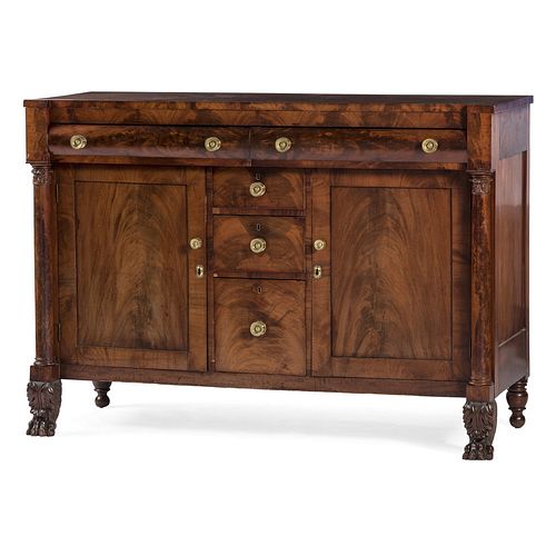 A Classical Carved and Figured Mahogany Sideboard