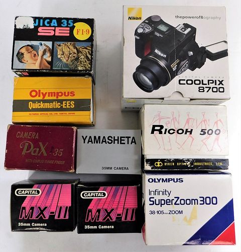 Group of 9 Japanese Cameras in Original Boxes
