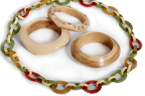 Lot comprising three bangles and a necklace