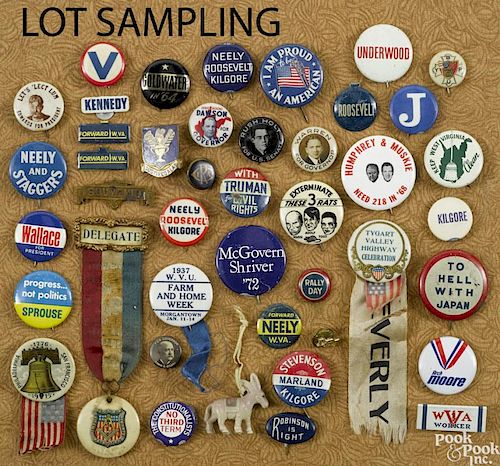 Large group of political pins and buttons.