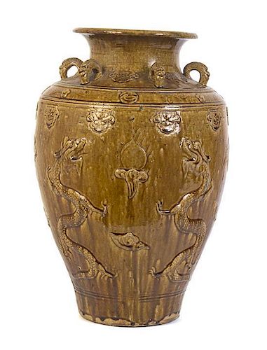 A Large Brown Glazed Stoneware Jar Height 23 1/4 inches.