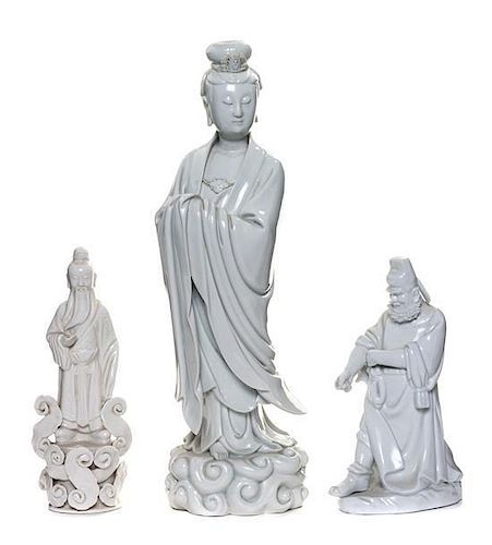 * A Blanc-de-Chine Figure of Guanyin Height of tallest 14 3/4 inches.