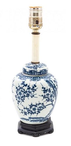 A Blue and White Covered Ginger Jar Height overall 13 inches.