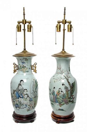 * A Pair of Famille Rose Porcelain Vases Height of porcelain 17 inches.