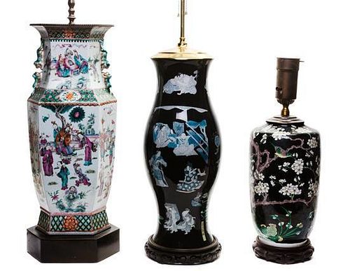 * A Group of Three Porcelain Vases Height of tallest 22 inches.