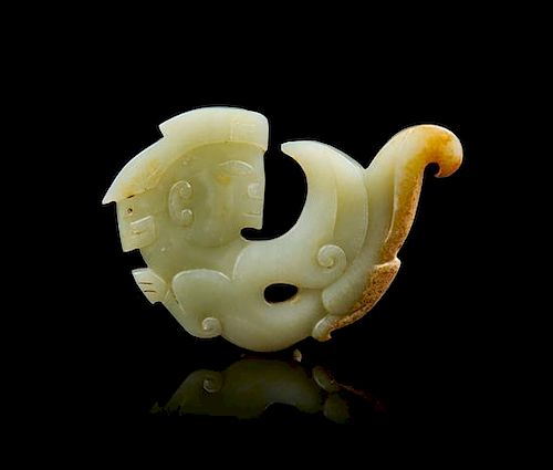 An Archaistic Jade Toggle Length 3 3/4 inches.