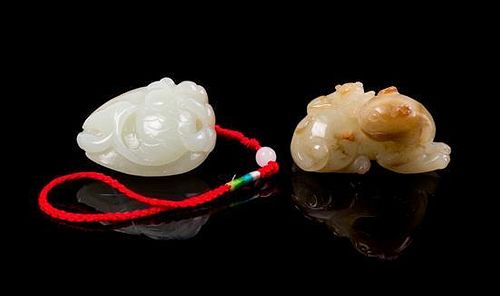 Two Carved Jade Toggles Length of longer 2 inches.