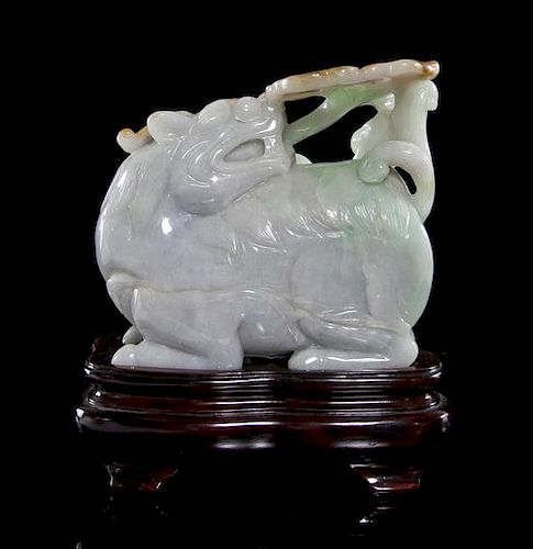 A Jadeite Carving of a Qilong Height 3 5/8 inches.