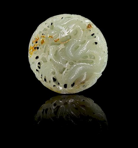 A Pierce Carved Jade Pendant Height 2 inches.