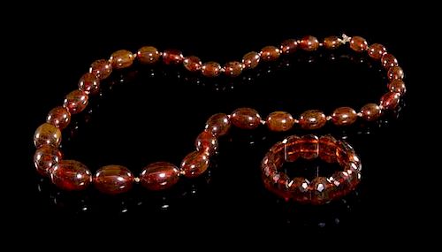 An Agate Beaded Necklace Length of first 14 1/2 inches.