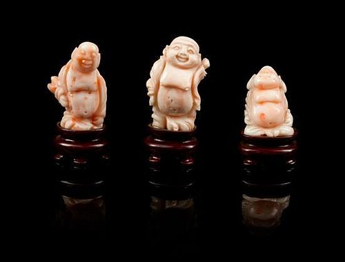 A Group of Three Carved Coral Figures Height of tallest 2 3/8 inches.