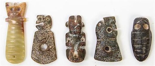 * A Group of Five Carved Hardstone Toggles Height of tallest 3 3/8 inches.