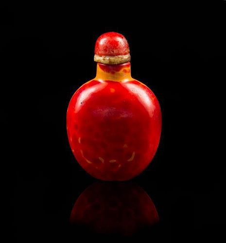 A Plastic Imitating Realgar Snuff Bottle Height 2 7/8 inches.