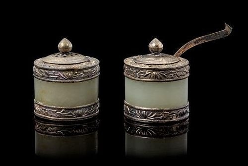 * A Pair of Silver and Jade Inset Salt and Pepper Height 1 1/4 inches.