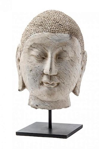 A Carved Stone Head of Buddha Height 12 inches.