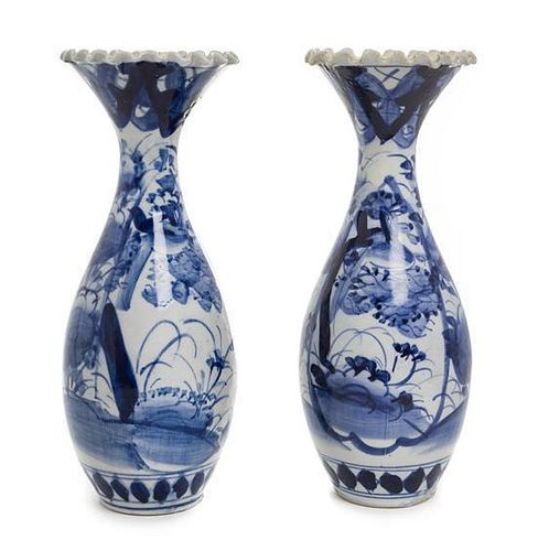 A Pair of Japanese Blue and White Porcelain Vases Height 10 1/8 inches.