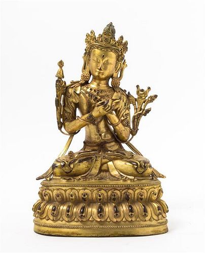 A Gilt Bronze Figure of a Bodhisattva Height 12 1/2 inches.