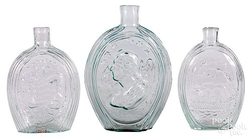 Three Historical aquamarine glass flasks