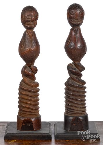 Pair of carved figural posts, early/mid 20th c.