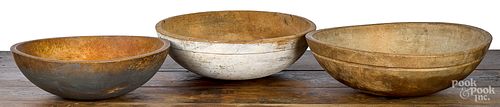 Group of three turned wooden bowls