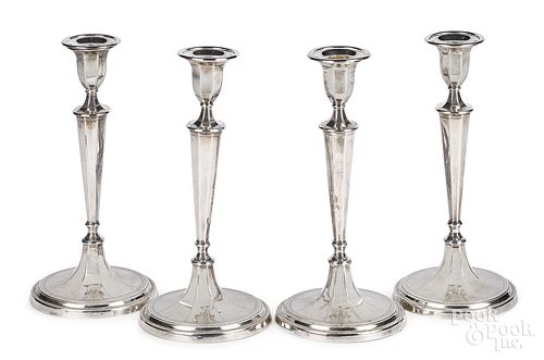 Set of four English Sheffield silver candlesticks