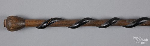 Carved and painted cane, early 20th c.