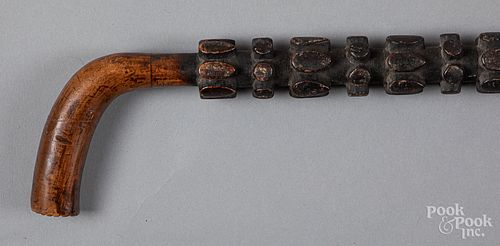 Carved and painted cane, late 19th c.