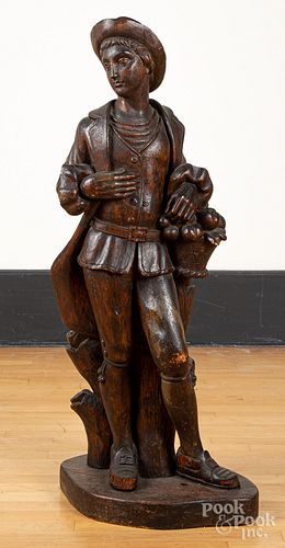 Carved pine figure of a young man, 19th c.