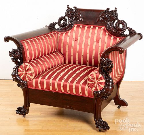 Carved mahogany lounge chair, early 20th c.