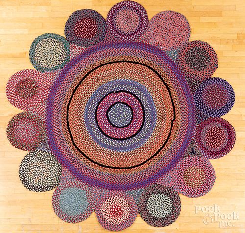 Unusual round room size braided rug