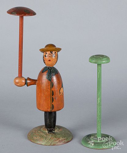 Two painted wig stands