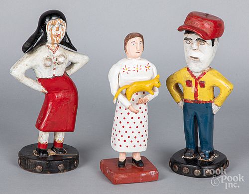 Three carved and painted folk art figures