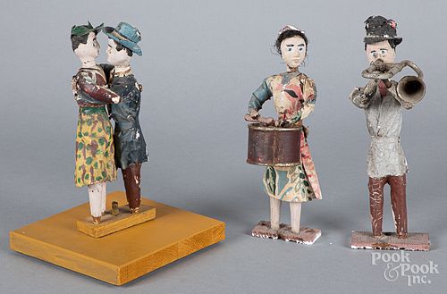 Three wood and papier mache folk art figures