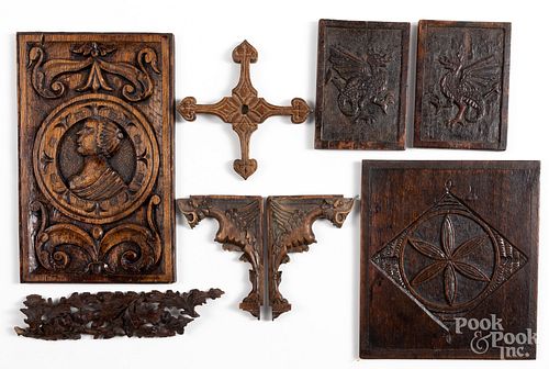 Continental carved oak plaques and ornaments