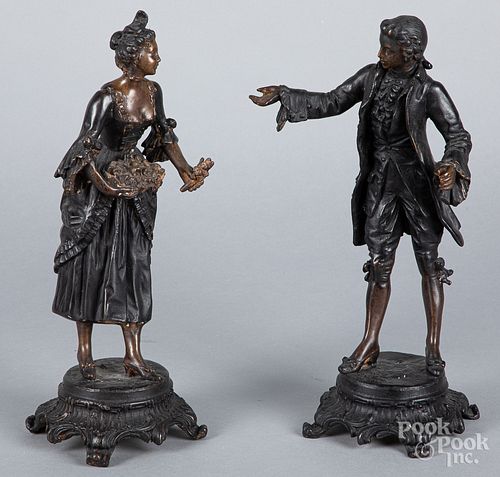 Pair of bronze figures of a man and woman